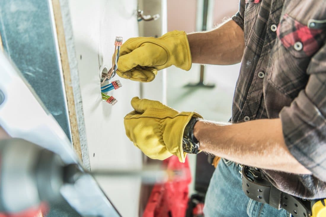 electrician installing an outlet