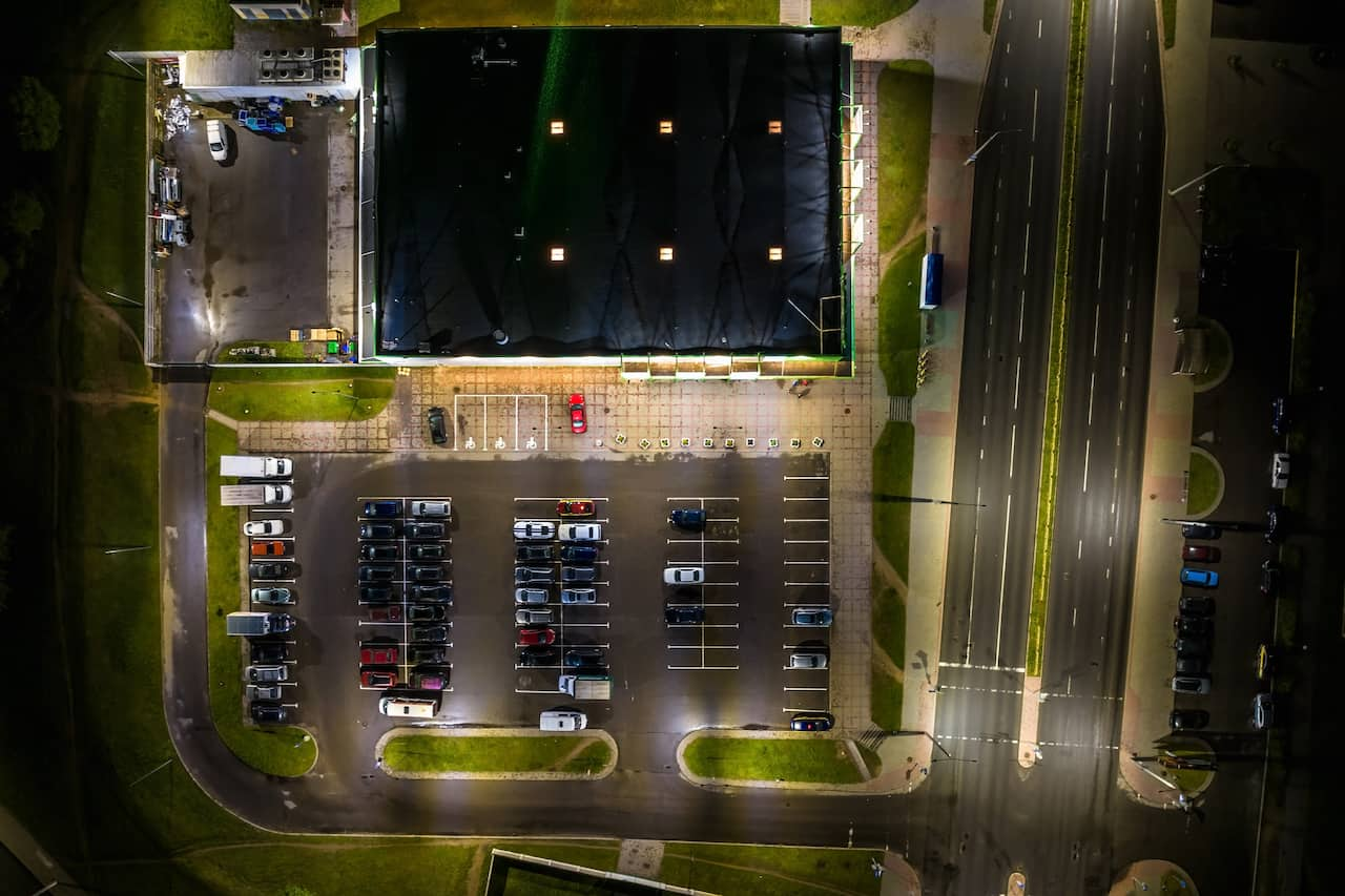 Aerial Night View of a Business District Parking lot